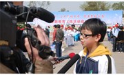 我校师生参加“小手牵动大手，共建美好家园”主题教育实践活动